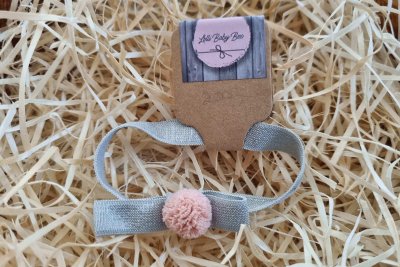 Szürke masnis hajgumi