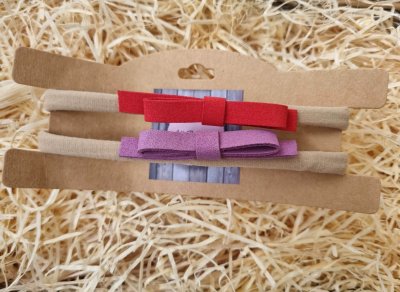 Barna hajpánt 2 db piros és lila masnival 